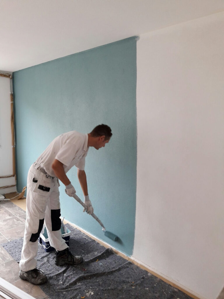 Behanger groen schilderrwerk